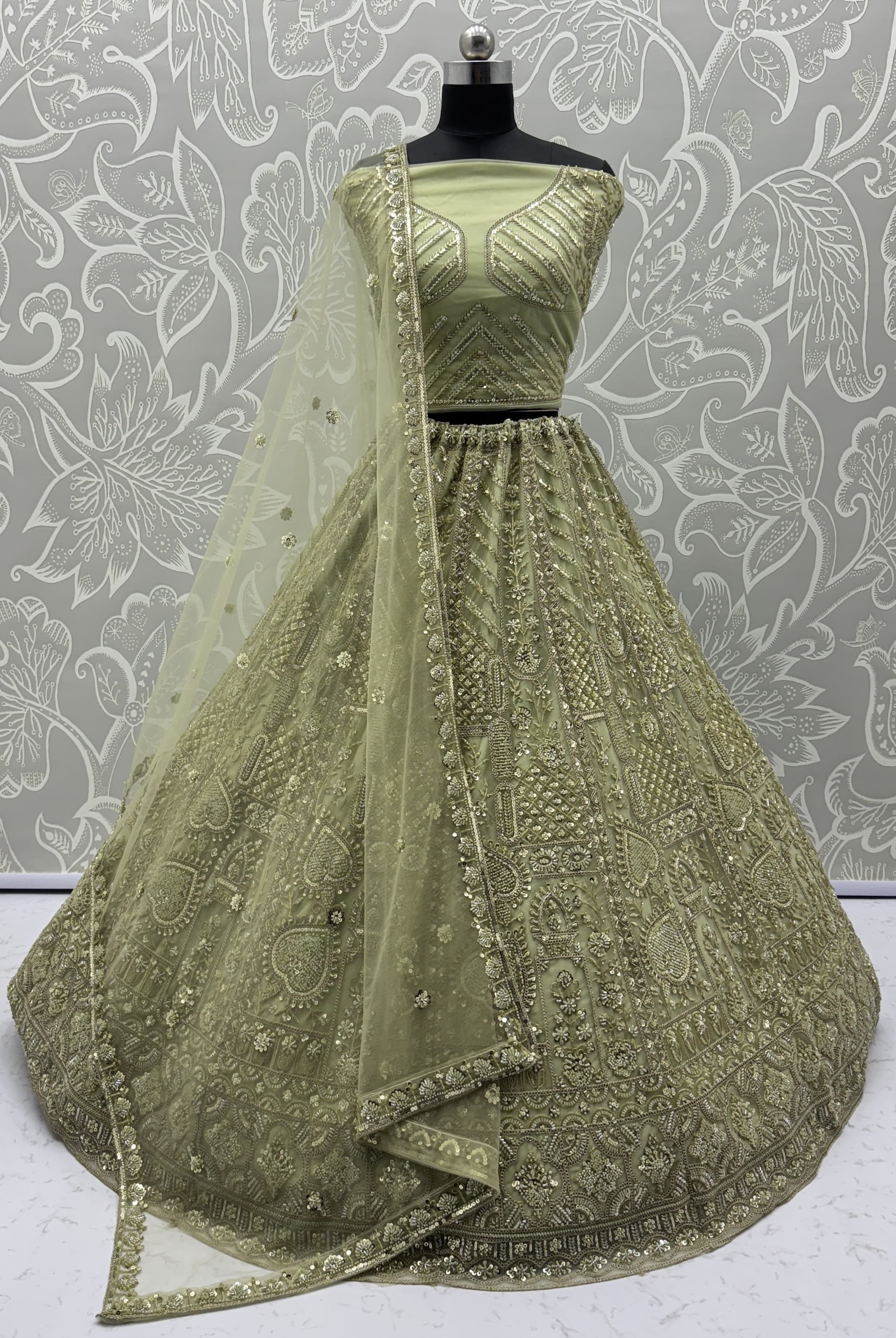 Sober Handwork Pastel Green Motif and Crystal Pipe work Designed Reception Wear Collection in Lehenga Choli